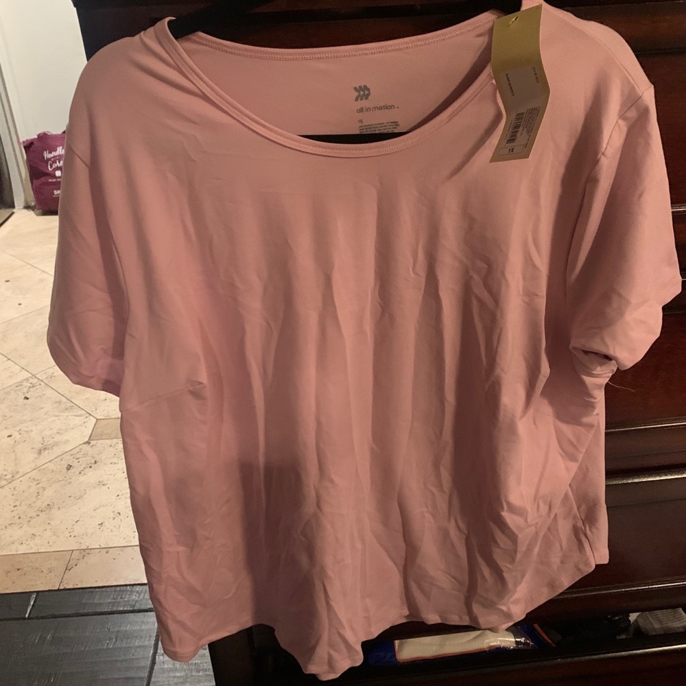 All in motion, light pink, workout tee shirt.